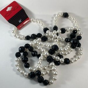 60” pearl and black bead extra long necklace by Claire’s